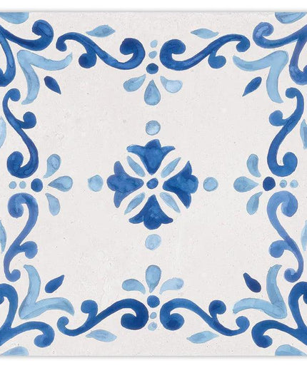 Decorative tile with blue floral patterns on a white background