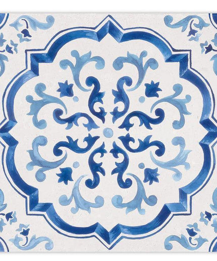 Decorative tile with blue and white floral pattern on a white background