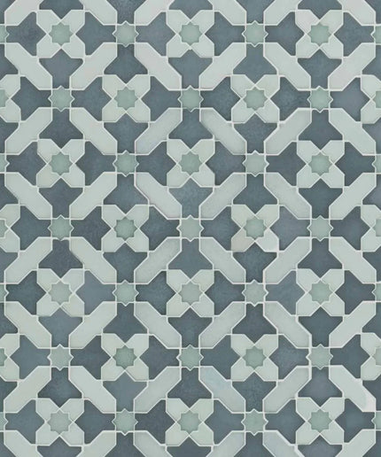 Patterned tile design with geometric shapes in blue and green tones.