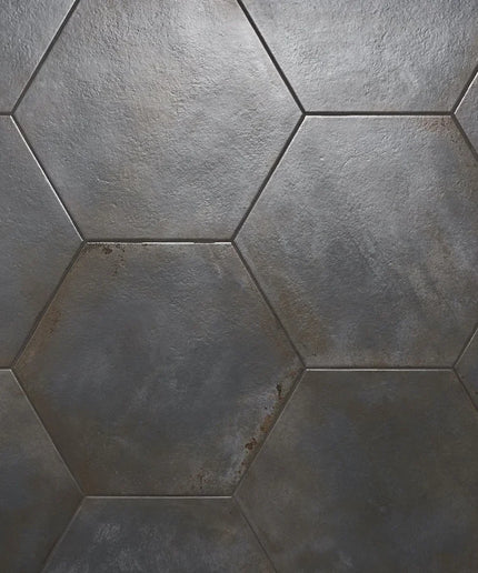 Hexagonal tiles with a gray, textured pattern