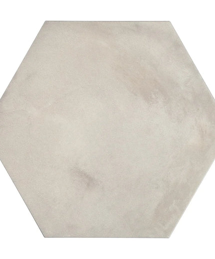 Hexagonal tile with a beige color on a white background