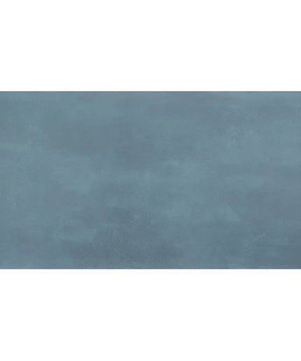 Rectangular blue tile with a textured surface on a white background