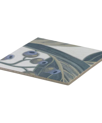 Decorative ceramic tile with artistic design on a white background