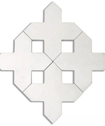Decorative white tile with geometric pattern on a white background