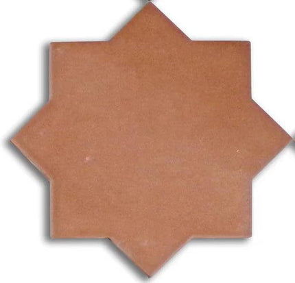 A matte finish porcelain tile in a star shape with a beige color.
