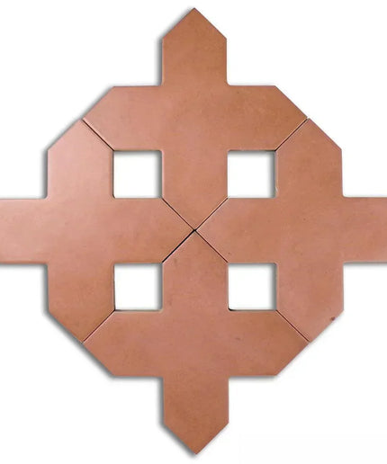 Decorative terracotta tile with geometric design on a white background