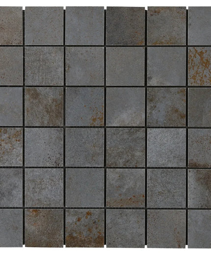 Mosaic pattern of square tiles with a rustic, weathered texture on a white background