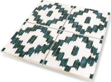 Patterned tiles with green and white design on a white background