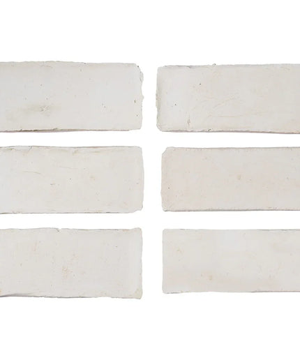 Set of six white rectangular tiles on a white background