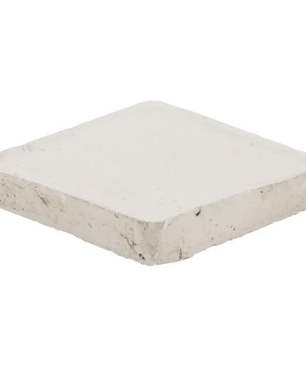 Rectangular stone slab on a white background