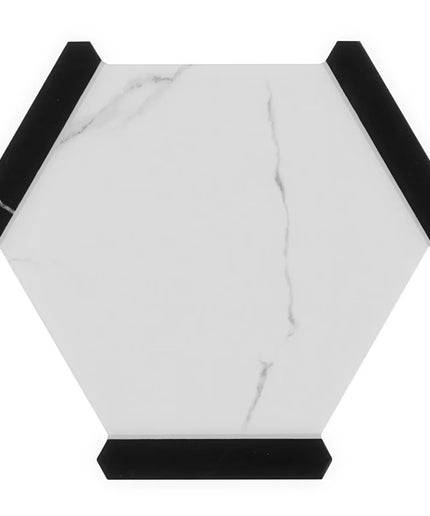 Hexagonal marble coaster with black edges on a white background