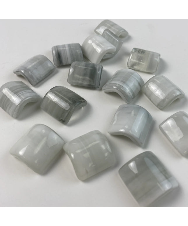 Glossy gray and white curved mosaic glass tile pieces for backsplash or bathroom decor
