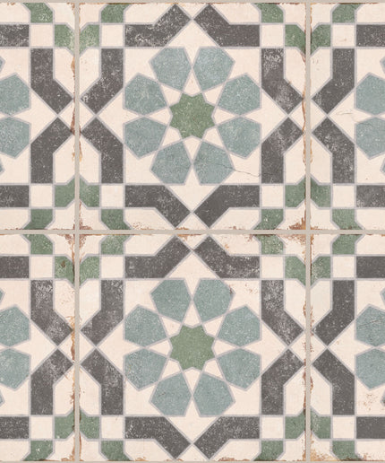 Geometric patterned ceramic tiles in green, blue, and gray for floor or wall decor