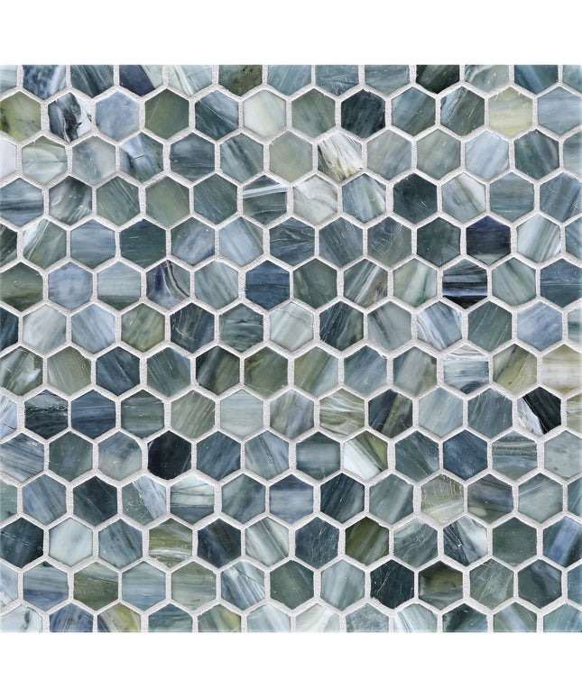 Hexagonal mosaic tile pattern in various shades of blue and green.