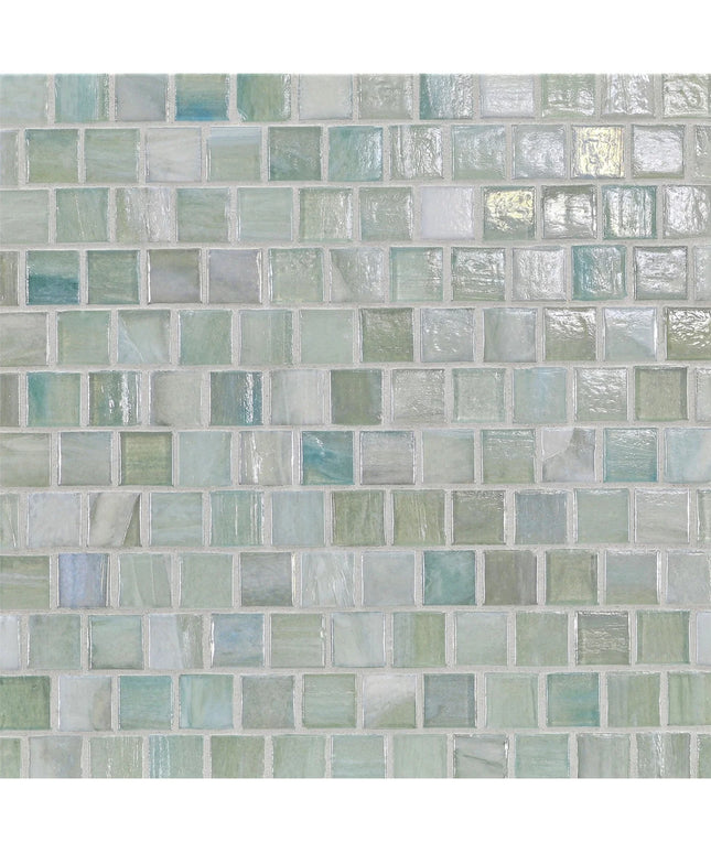 Pattern of small square tiles in various shades of green and blue.