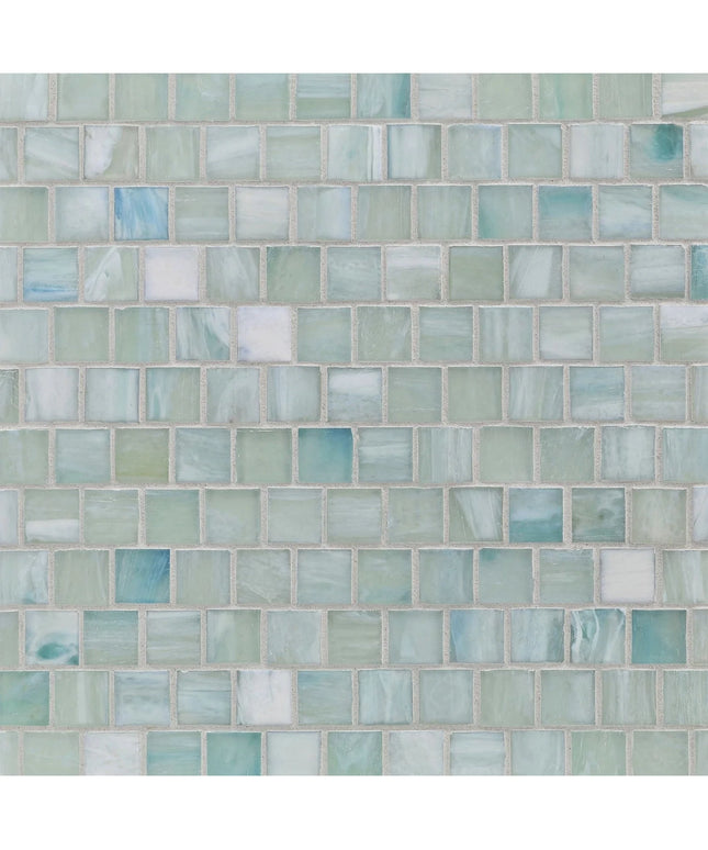 Mosaic pattern of small square tiles in various shades of green and blue.