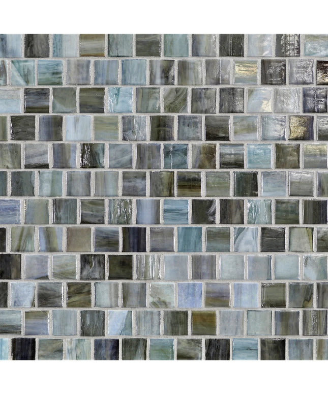 Pattern of small square tiles in various shades of gray and blue.