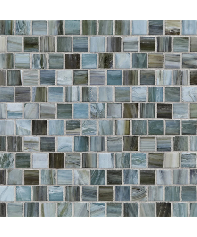 Pattern of small square tiles in various shades of blue and gray.