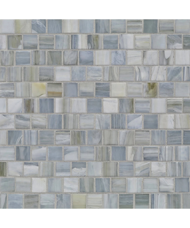 Mosaic pattern of small square tiles in various shades of gray and blue.