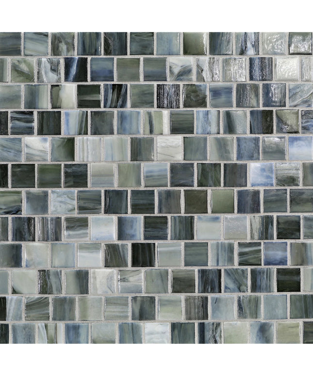 Pattern of small square tiles in various shades of gray and blue.