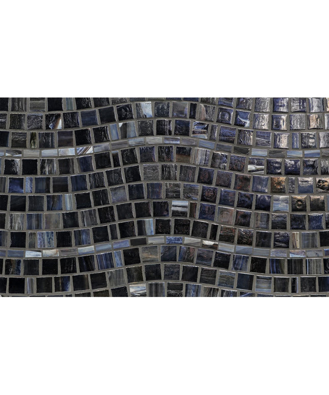 Mosaic pattern made of small square tiles in various shades of gray on a white background