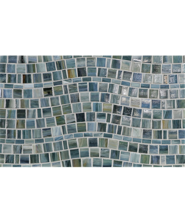 Mosaic pattern of blue and green tiles on a white background