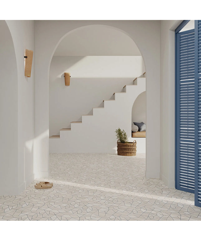 Staircase in a modern interior with white walls and a blue door.