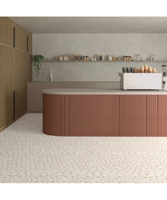 Modern kitchen with wooden cabinets and a white countertop.