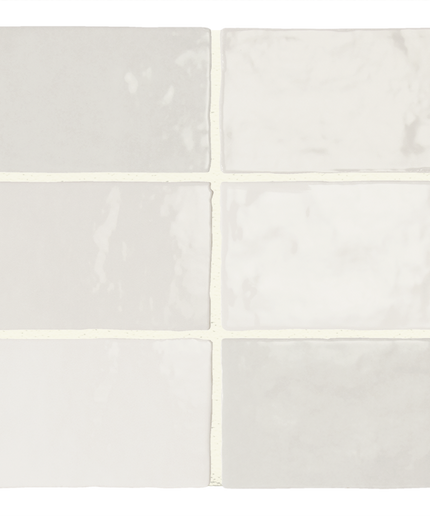 Set of six white tiles with a subtle pattern on a white background