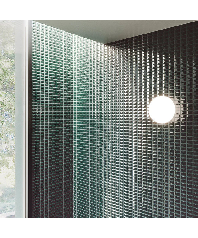 Bevel_Emerald_Gloss-bath Green perforated metal panel with a light fixture on a ceiling