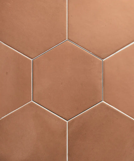 Hexagonal brown tiles arranged in a pattern