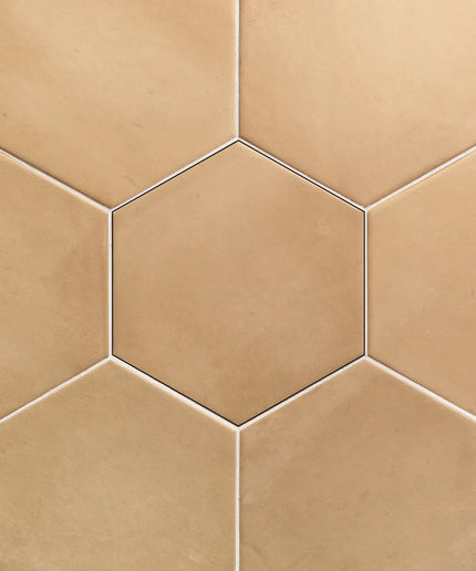 Hexagonal beige tiles arranged in a pattern