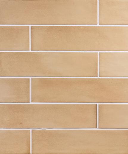 Beige ceramic tiles arranged in a grid pattern