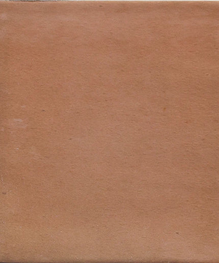 Brown square tile with a textured surface