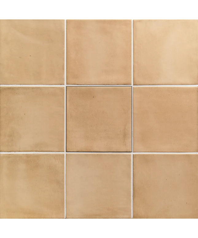 Grid of beige tiles with a subtle pattern