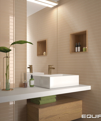 Modern bathroom with a sink, mirror, and decorative elements.
