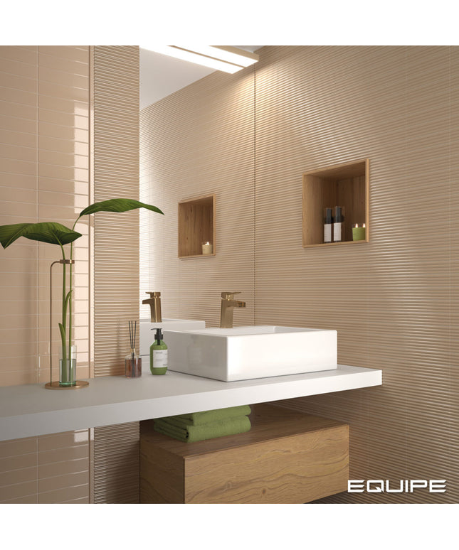 Modern bathroom with a sink, mirror, and decorative elements.