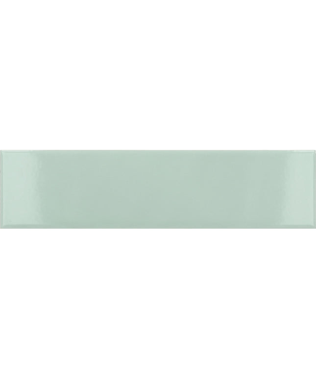 A glossy rectangular ceramic tile in a pale mint green color, shown from a top-down perspective with a subtle sheen.
