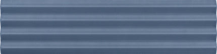 A close-up of a blue-gray corrugated metal panel showing its horizontal ridges and textured surface.