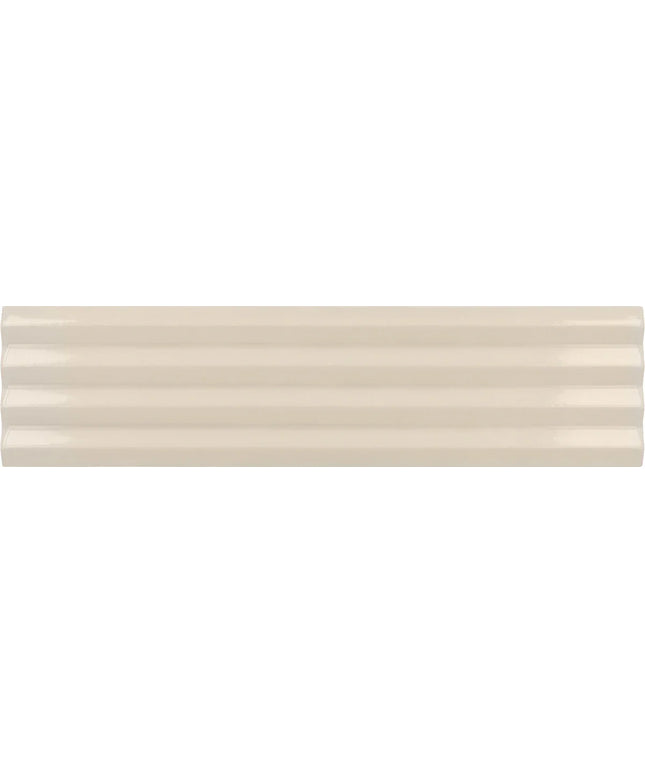 A close-up of a glossy, cream-colored ceramic tile with a subtle wavy texture.
