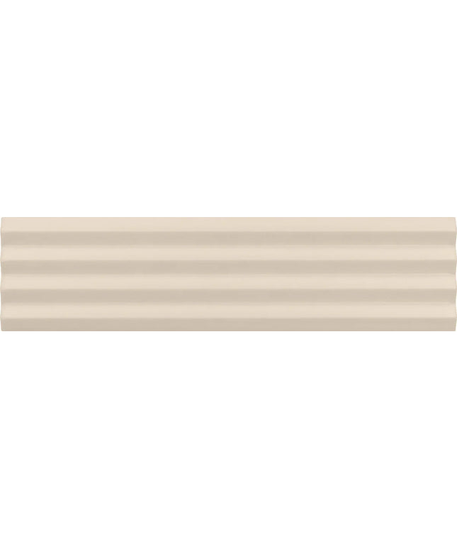 A close-up of a light beige or cream textured surface with subtle horizontal ridges.