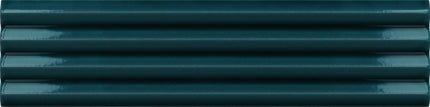 A close-up texture shot of dark teal-green horizontal ridged siding or siding panels.