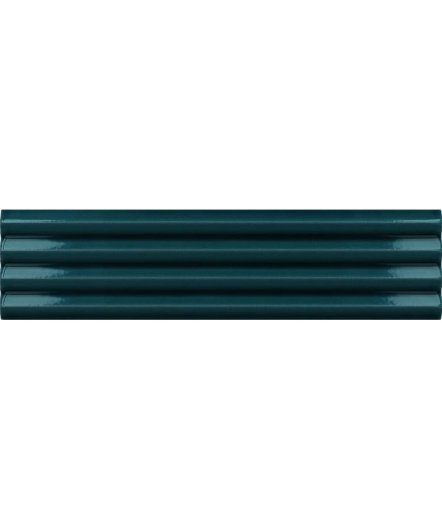 A close-up texture shot of dark teal-green horizontal ridged siding or siding panels.