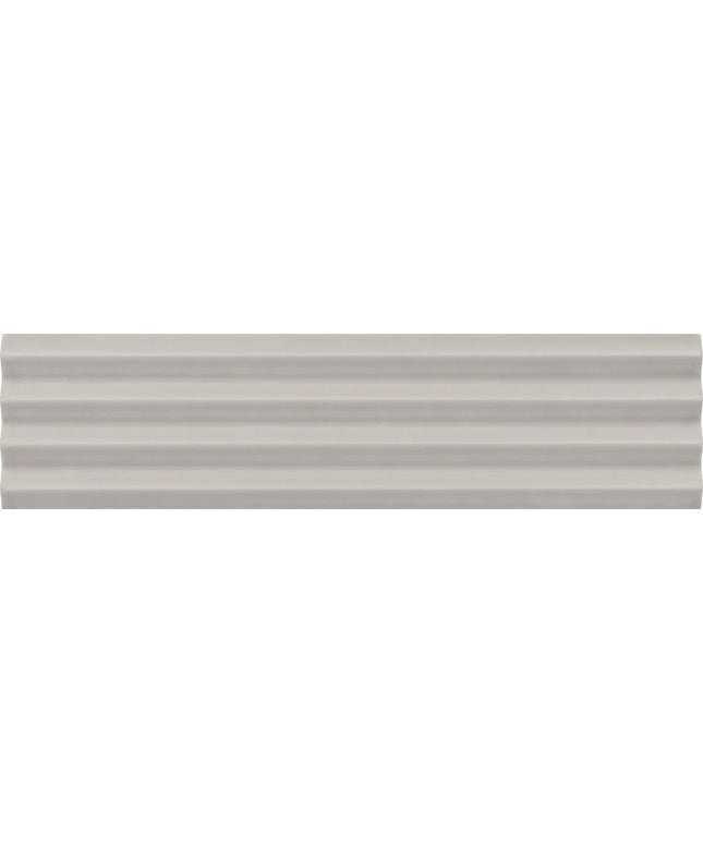 A close-up of a light gray ribbed or corrugated material surface with horizontal ridges.