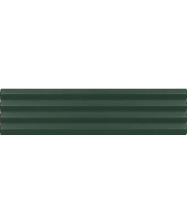 A close-up of a dark forest green textured surface with horizontal ridges.