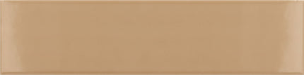 A glossy rectangular ceramic tile in a warm tan or camel shade, shown against a matching background.