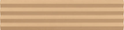 A close-up of a beige ribbed material surface with horizontal grooves and a smooth, slightly glossy finish.