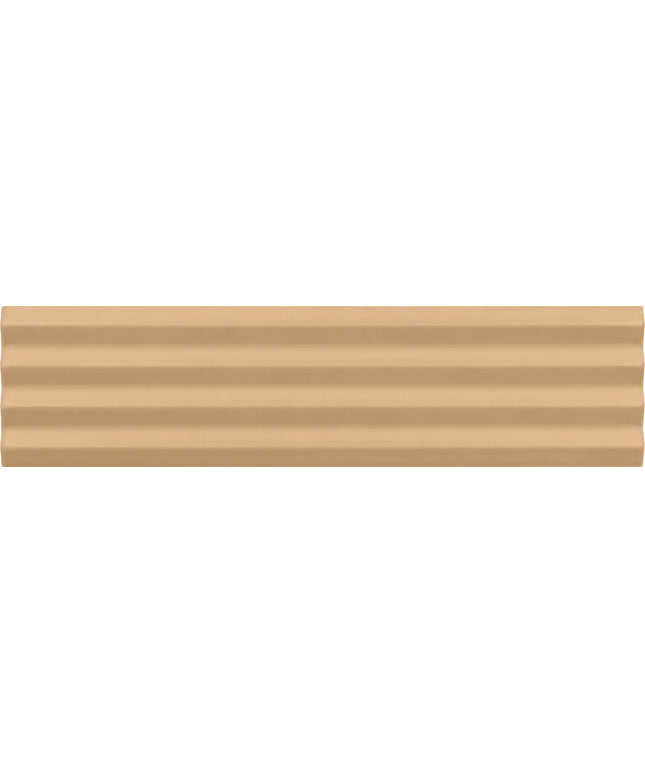A close-up of a beige ribbed material surface with horizontal grooves and a smooth, slightly glossy finish.