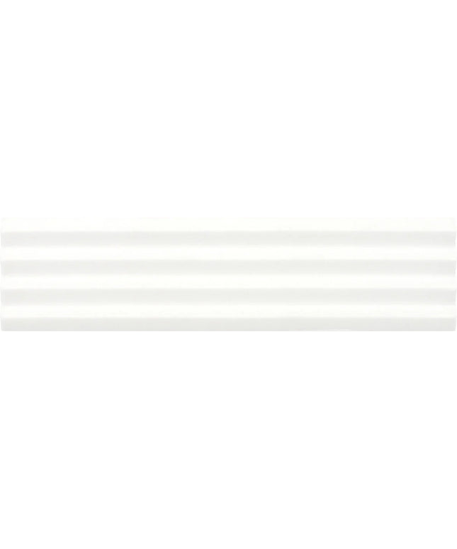 A close-up of a white textured material with subtle horizontal ridges and soft shading.