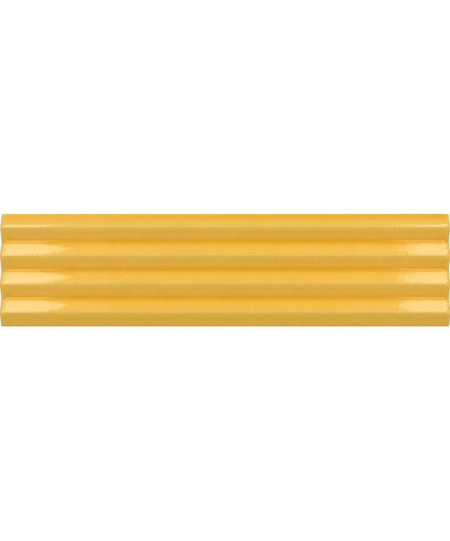 A close-up of a glossy yellow ribbed surface, likely a material or color swatch.